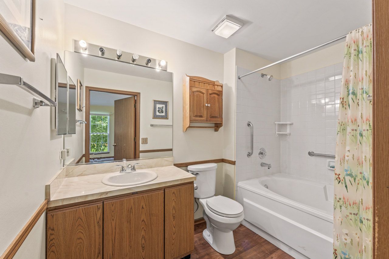 1228 Coldspring Road Elgin, IL 60120 - Photo 21 of 30 a bathroom with a sink toilet and shower