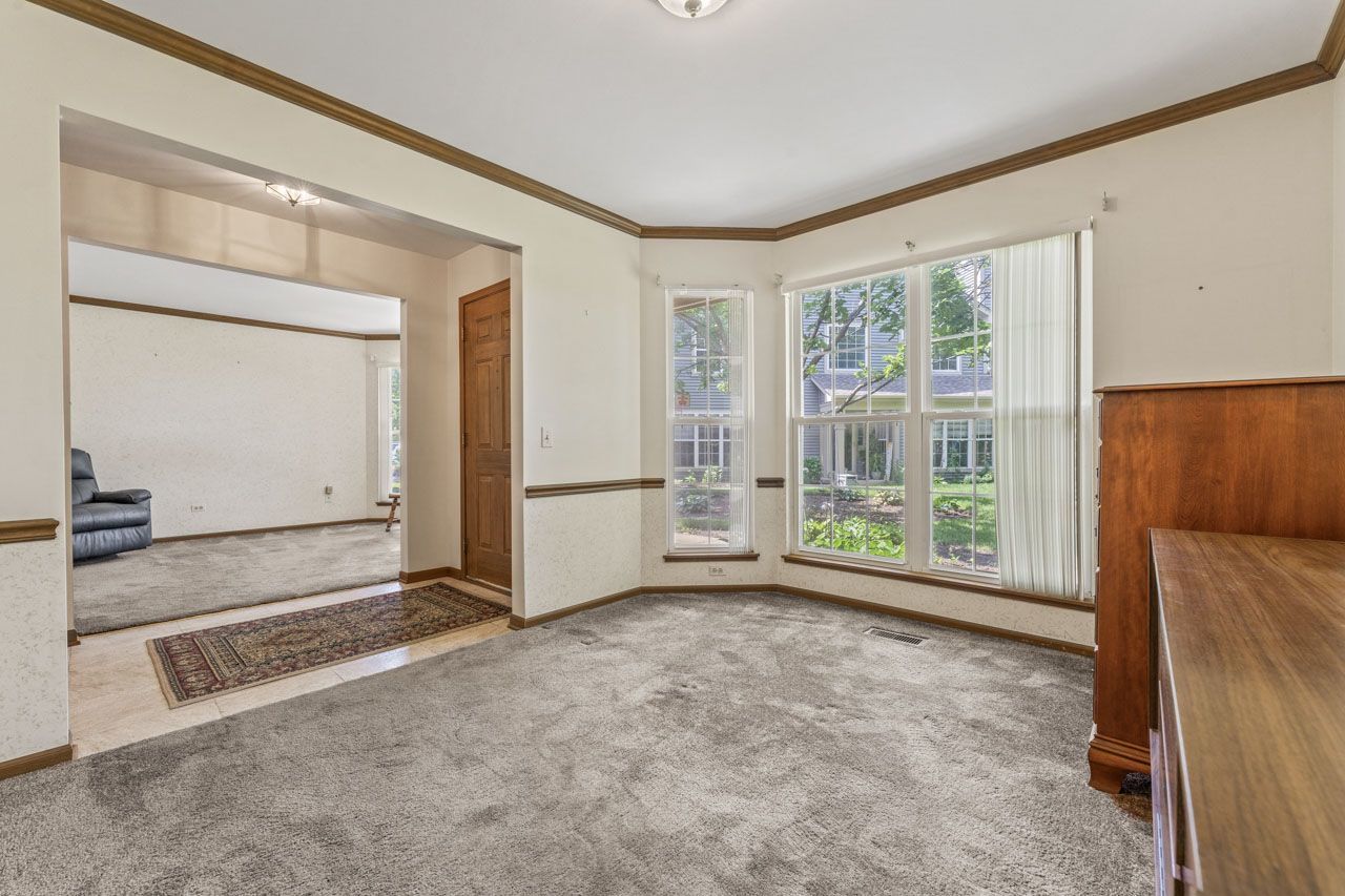 1228 Coldspring Road Elgin, IL 60120 - Photo 8 of 30 a view of an empty room with a window