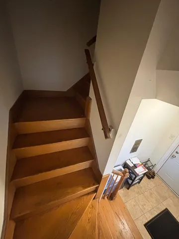 a room with furniture and gym equipment