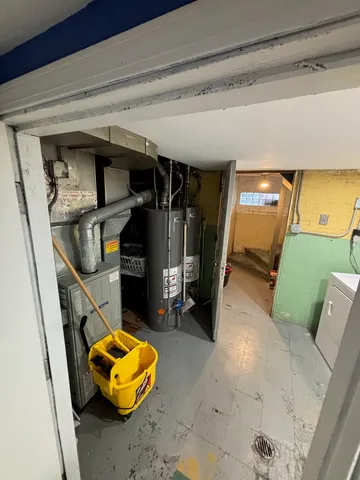 a front view of a building with parking space