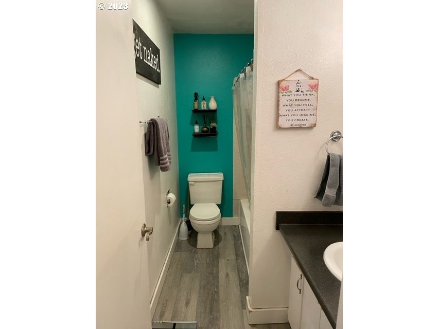 2727 Gateway Street, Unit 38 Springfield, OR 97477 - Photo 11 of 14 a bathroom with a toilet and a shower