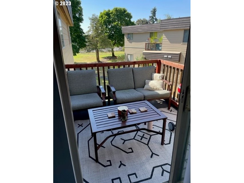 2727 Gateway Street, Unit 38 Springfield, OR 97477 - Photo 7 of 14 a roof deck with table and chairs