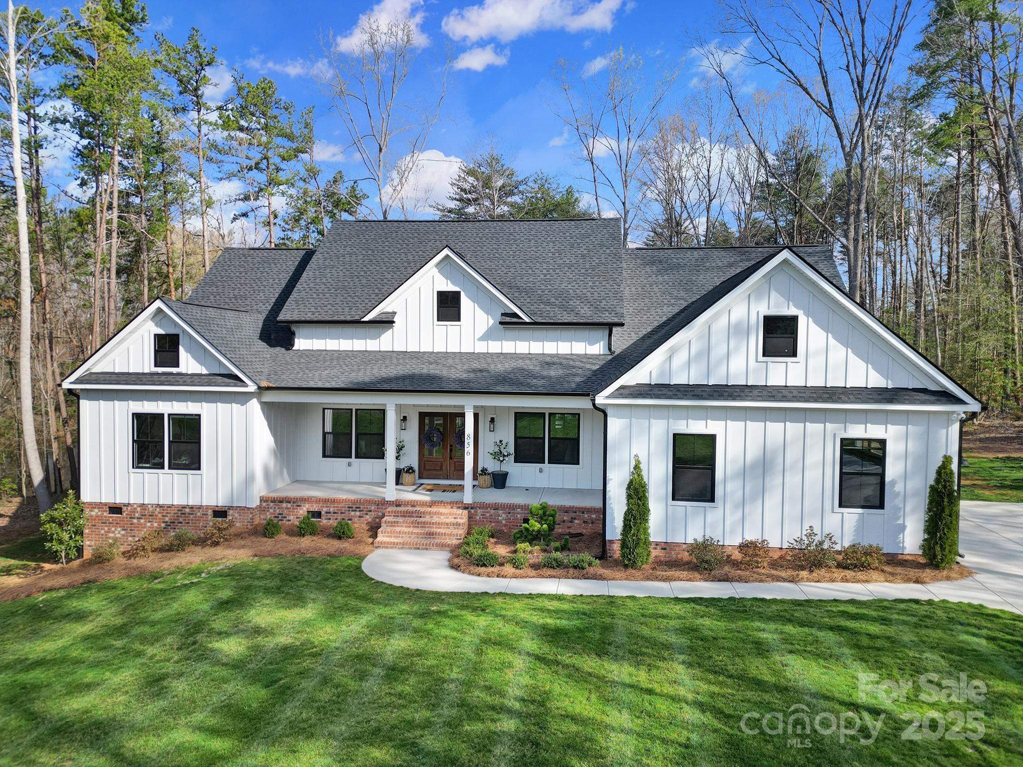 856 Bellegray Road Clover, SC 29710 - Photo 1 of 48 a front view of house with yard and green space