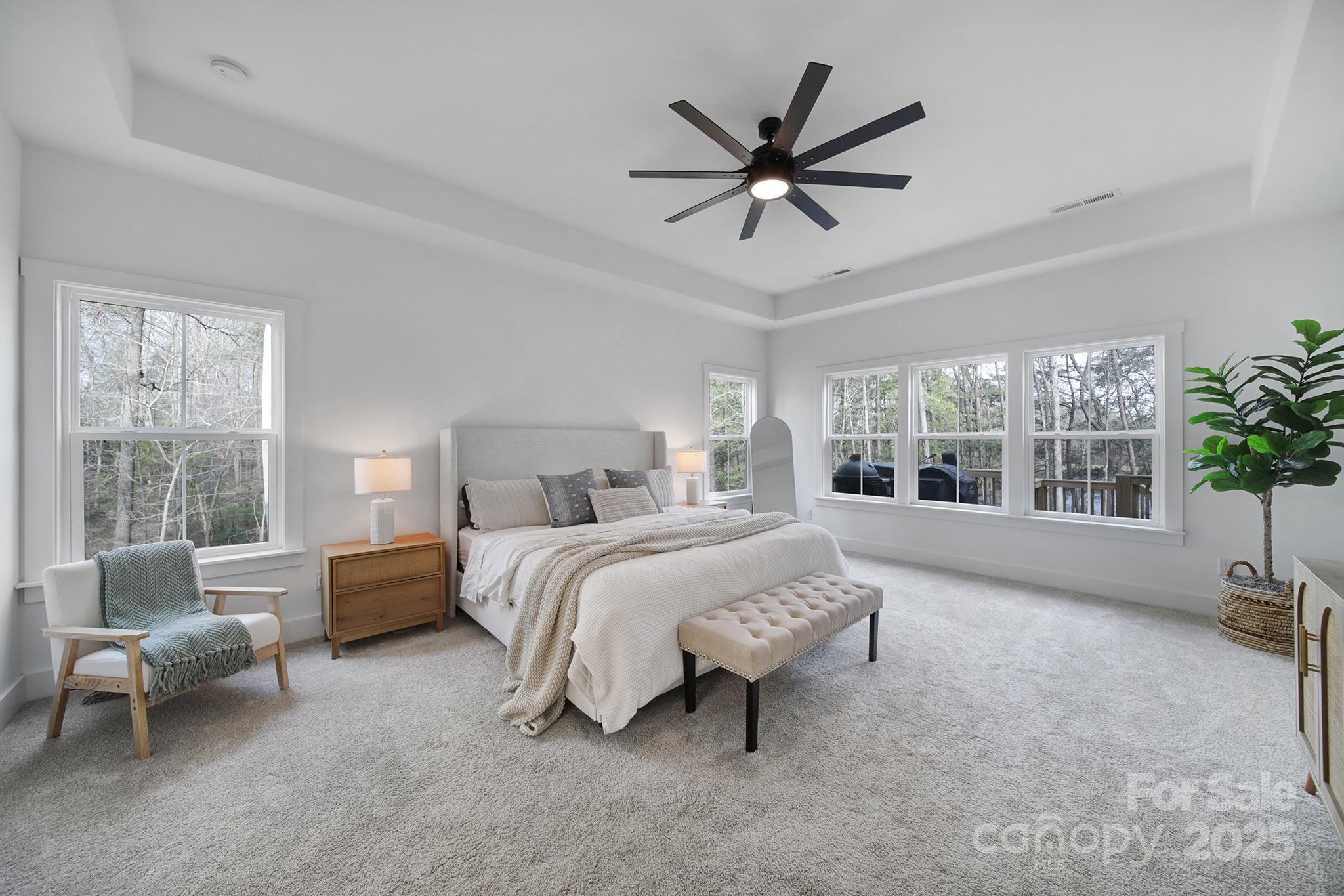 856 Bellegray Road Clover, SC 29710 - Photo 18 of 48 a bed room with a bed and a large window