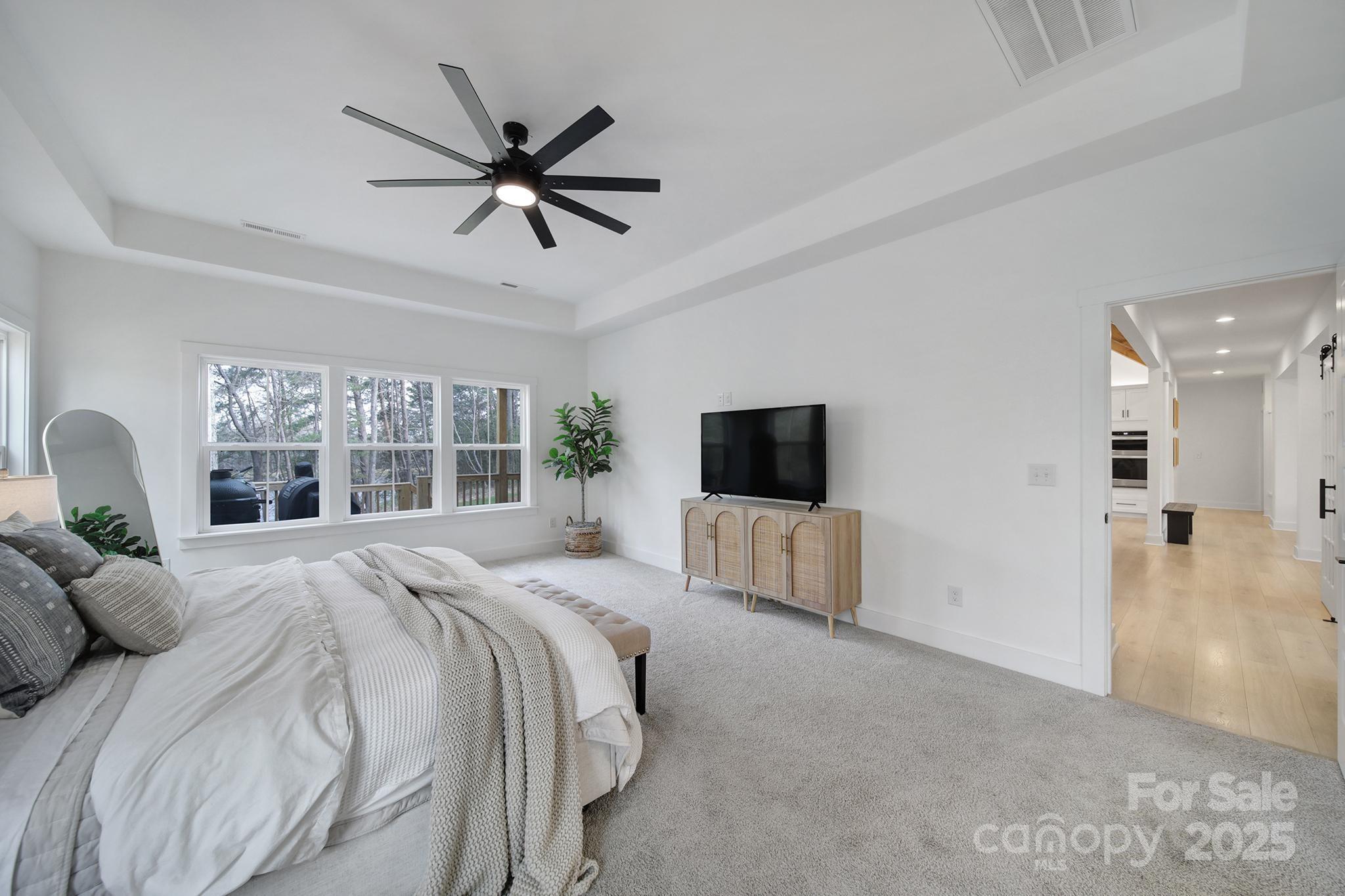 856 Bellegray Road Clover, SC 29710 - Photo 20 of 48 a bedroom with a bed and a flat screen tv