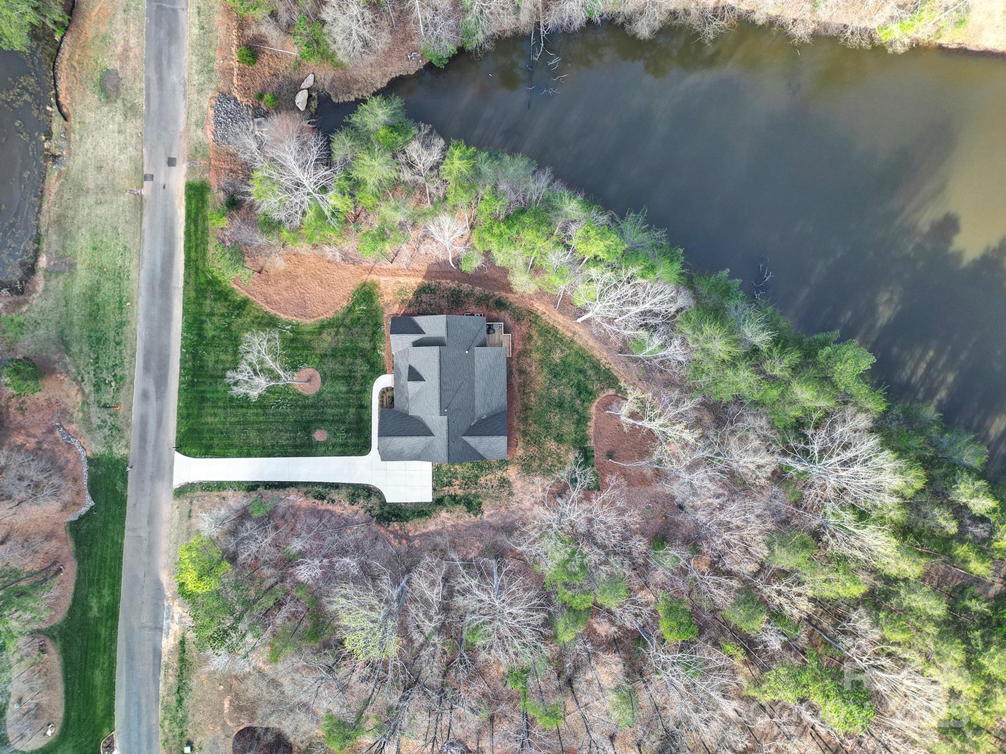 856 Bellegray Road Clover, SC 29710 - Photo 2 of 48 a backyard of a house with lots of green space