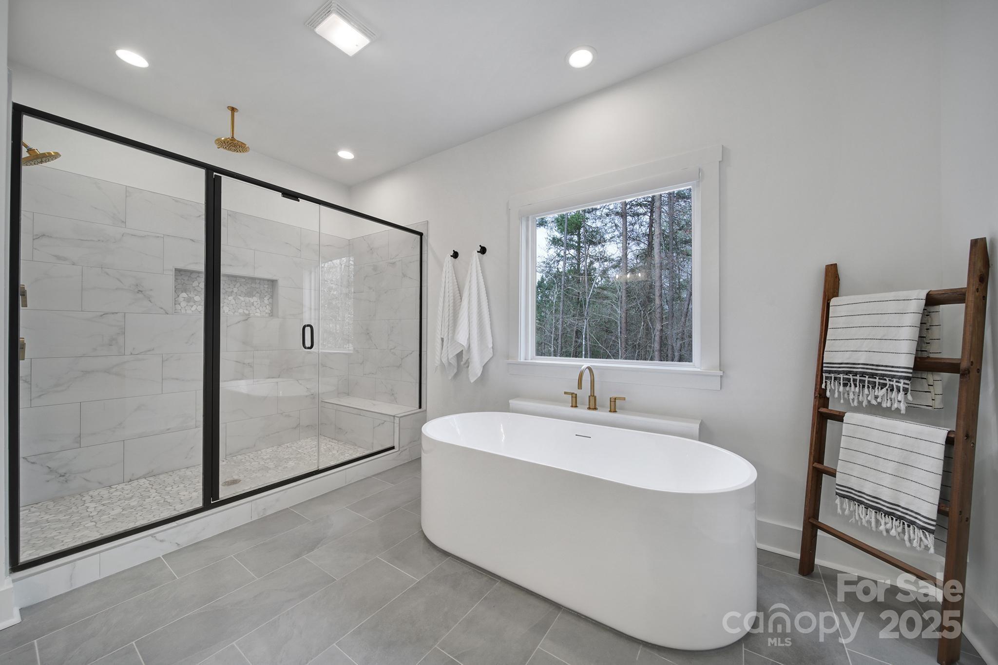 856 Bellegray Road Clover, SC 29710 - Photo 22 of 48 a spacious bathroom with a bathtub and a sink