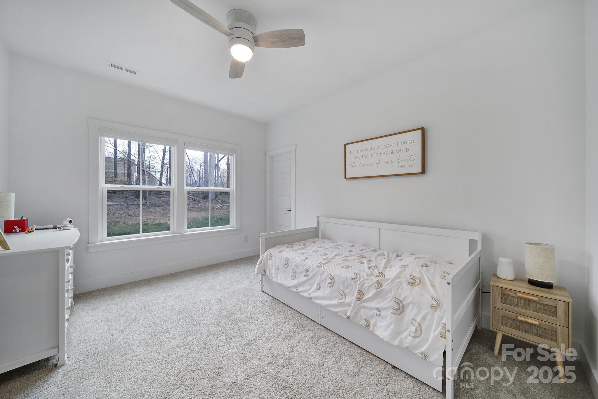 856 Bellegray Road Clover, SC 29710 - Photo 28 of 48 a bedroom with bed and window