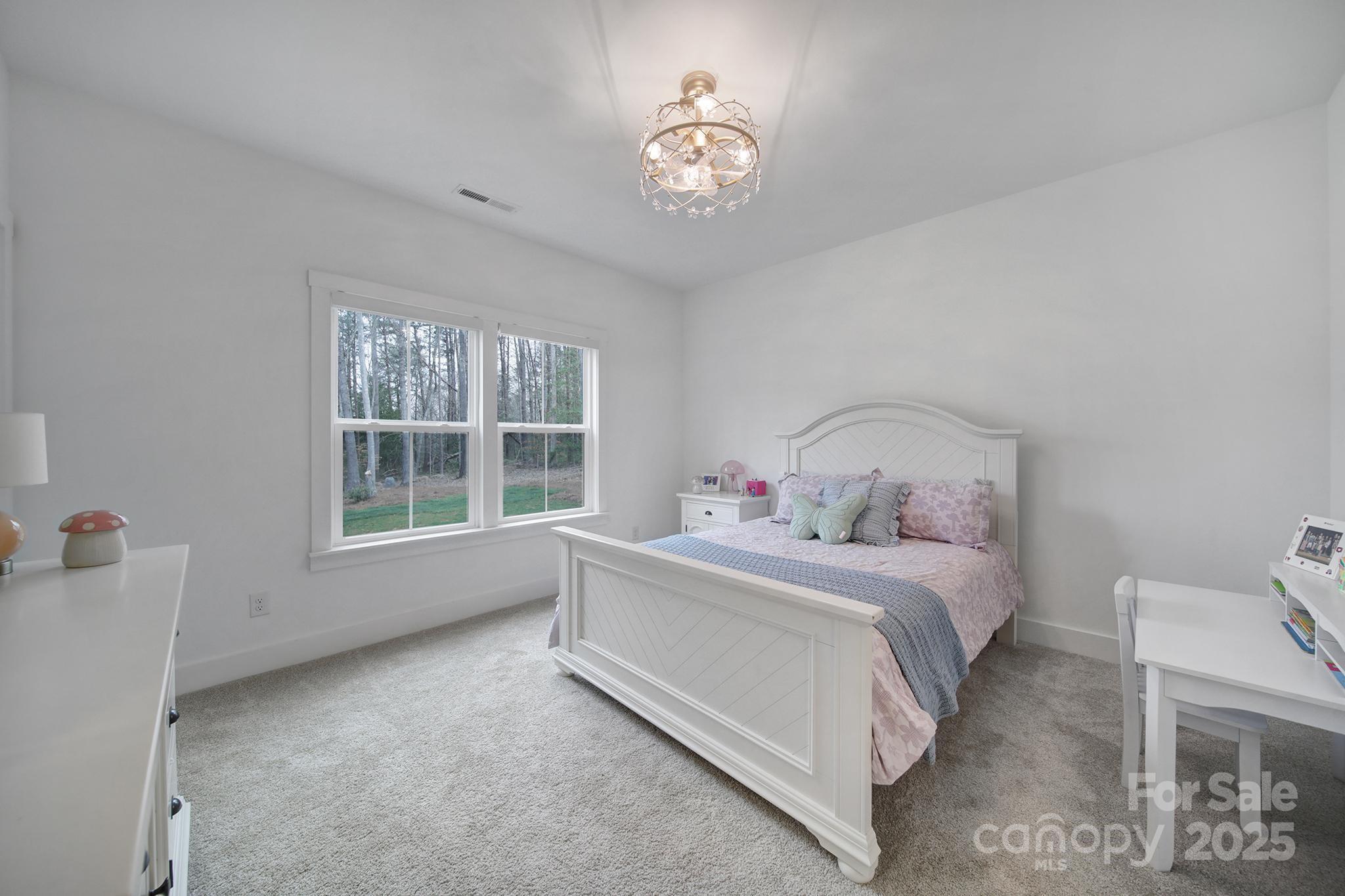 856 Bellegray Road Clover, SC 29710 - Photo 31 of 48 a bed room with a bed and a window