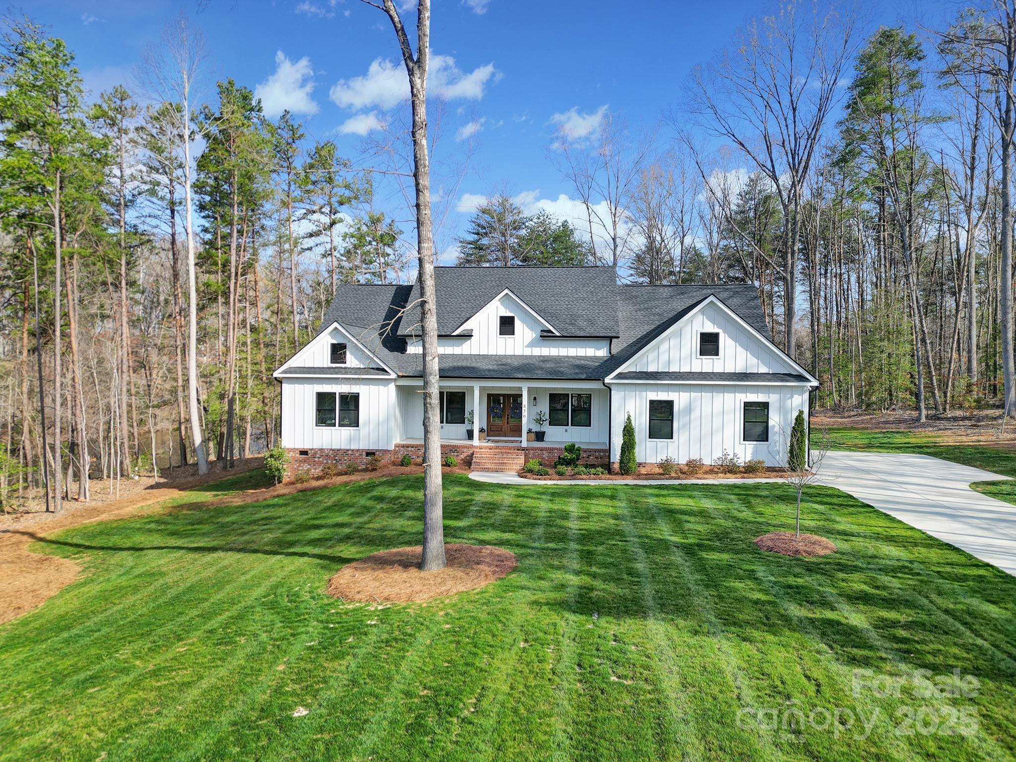 856 Bellegray Road Clover, SC 29710 - Photo 40 of 48 a front view of a house with a yard