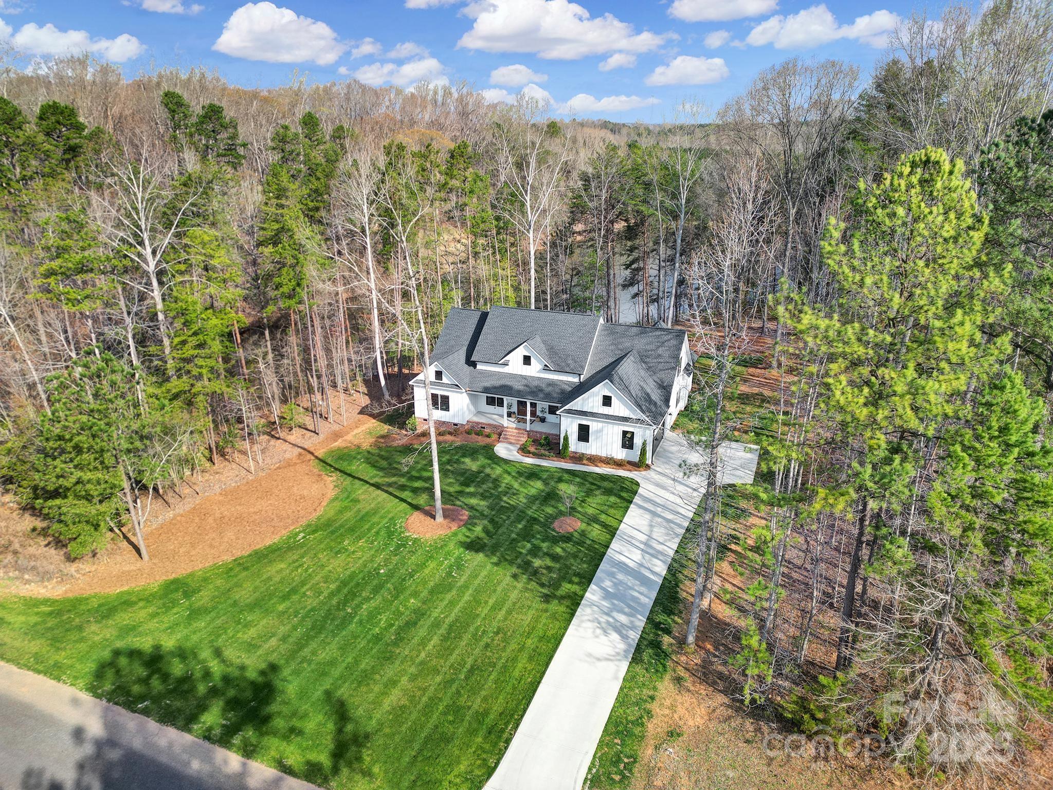 856 Bellegray Road Clover, SC 29710 - Photo 43 of 48 an aerial view of a house with a yard