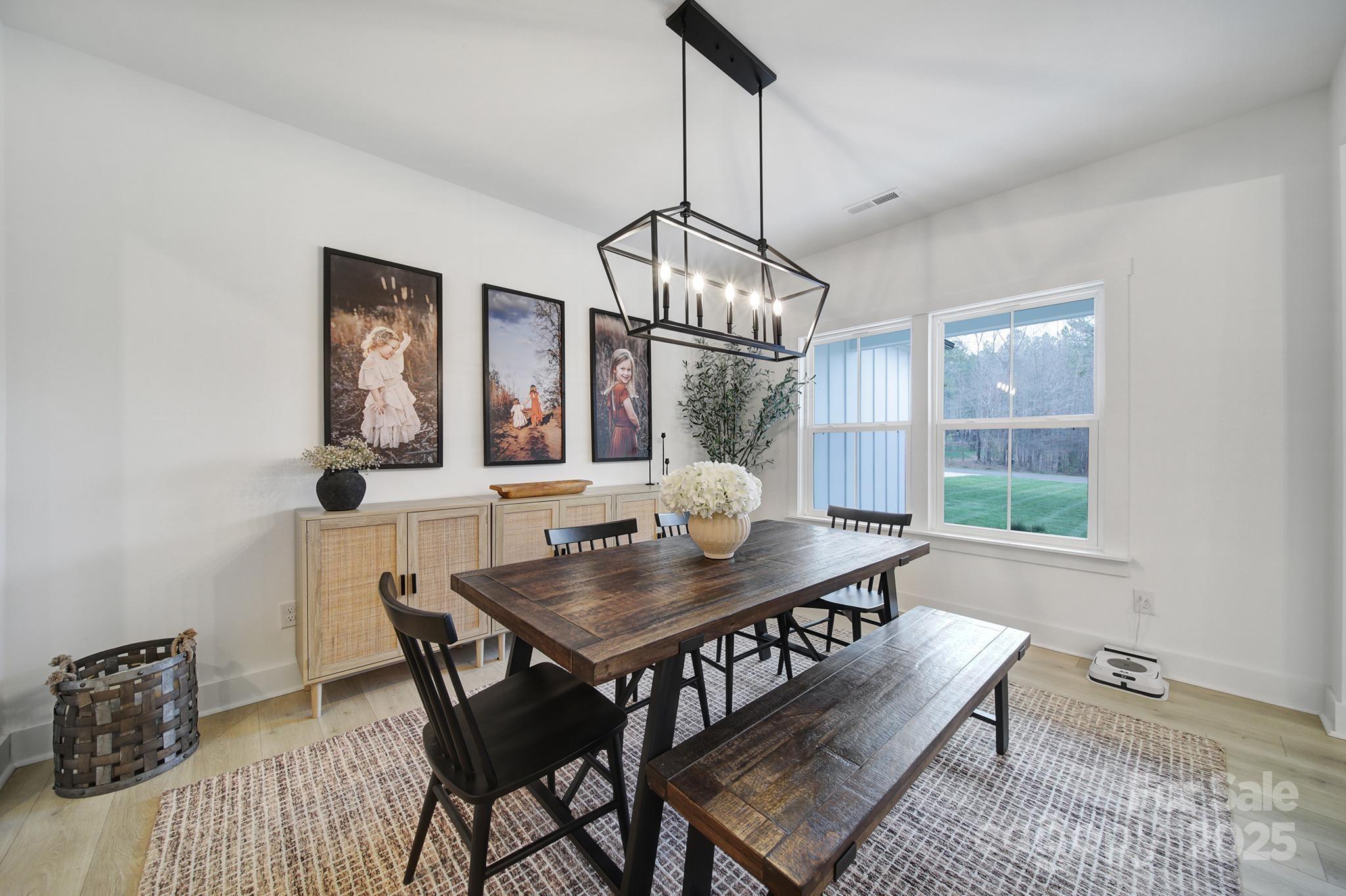 856 Bellegray Road Clover, SC 29710 - Photo 5 of 48 a view of a dining room with furniture window and wooden floor