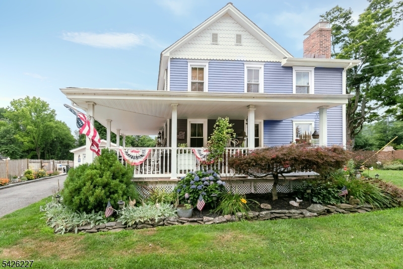 36 Main Street Flanders, NJ 07836 - Photo 1 of 49 front view of a house with a yard