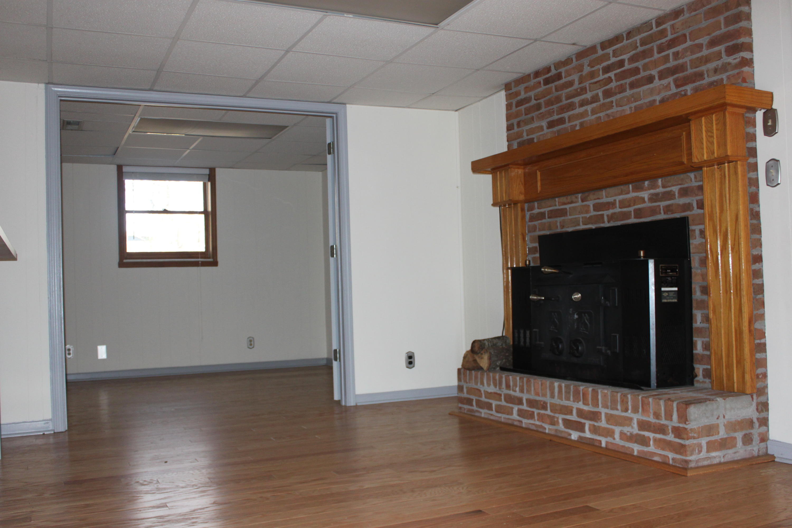 212 Disco Loop Road Friendsville, TN 37737 - Photo 18 of 40 Wood Burning Stove/Lower Level Bedroom