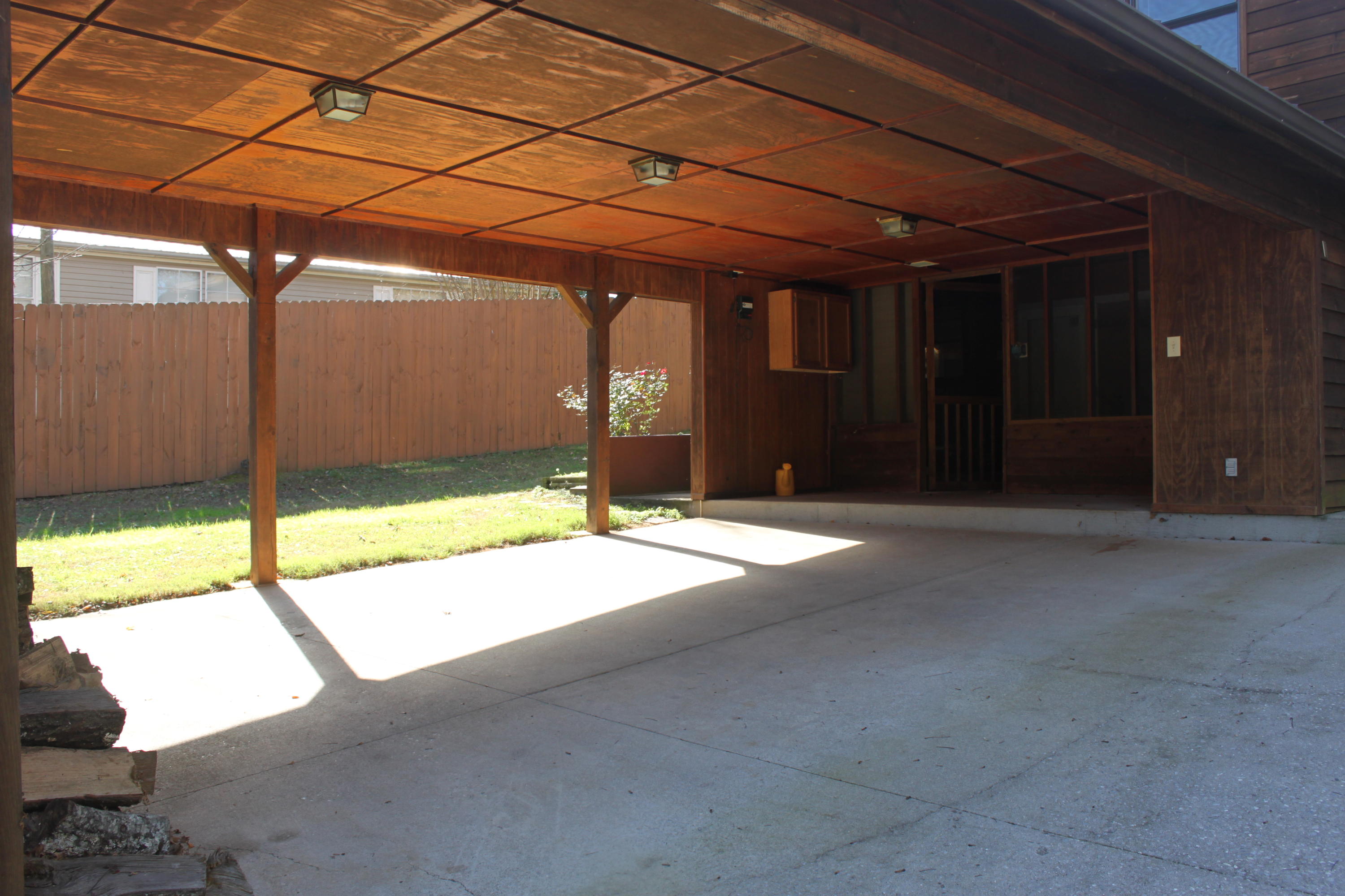 212 Disco Loop Road Friendsville, TN 37737 - Photo 36 of 40 Covered parking area attached to house