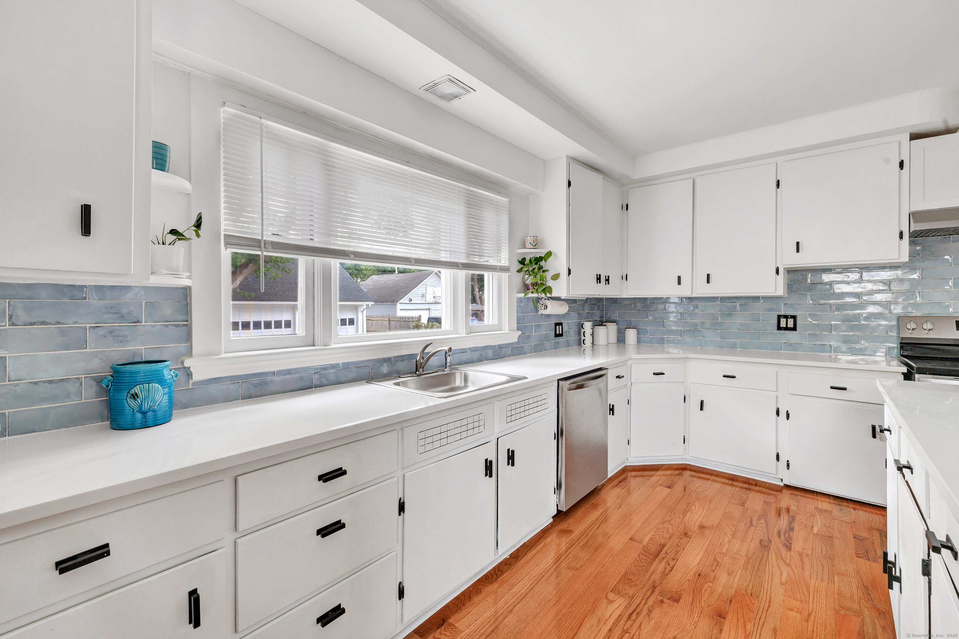 37 Linden Street Torrington, CT 06790 - Photo 1 of 1 a kitchen with cabinets appliances a sink and a window
