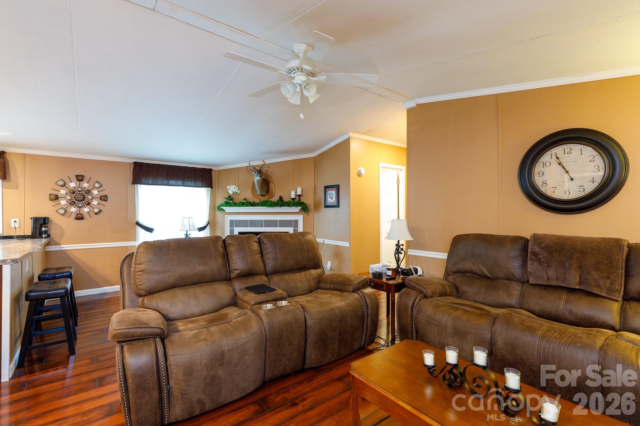 652 Sutton Spring Road York, SC 29745 - Photo 5 of 28 a living room with furniture and a large window