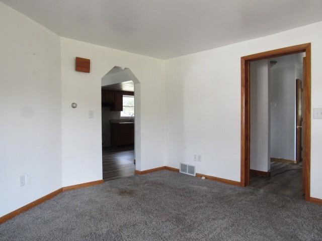 123 2nd Street Normalville, PA 15469 - Photo 12 of 26 a view of empty room with wooden floor and entryway