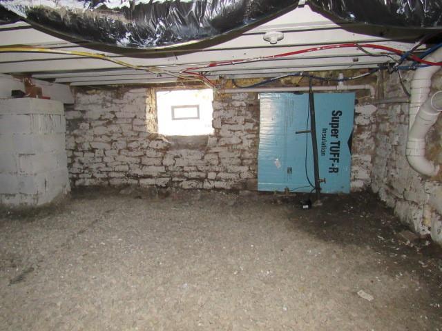 123 2nd Street Normalville, PA 15469 - Photo 24 of 26 a view of a fireplace with an empty space