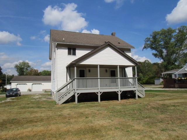 123 2nd Street Normalville, PA 15469 - Photo 4 of 26 a house with trees in the background