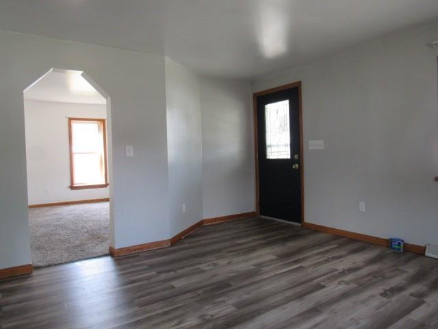 123 2nd Street Normalville, PA 15469 - Photo 8 of 26 an empty room with wooden floor and windows