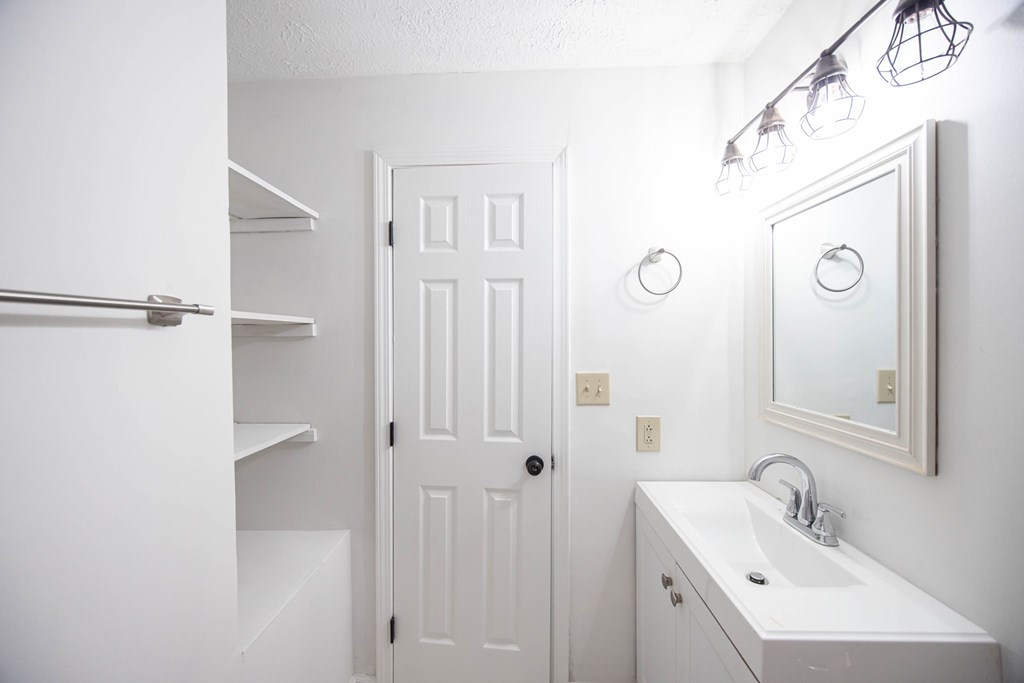 246 Sunnyside Church Road Pine Mountain, GA 31822 - Photo 15 of 26 a bathroom with a sink and mirror