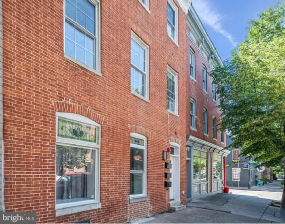 a bricked building with a street