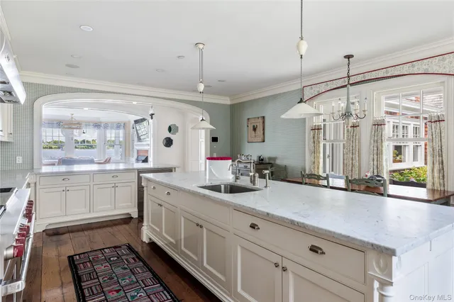 a view of a livingroom with furniture window and wooden floor