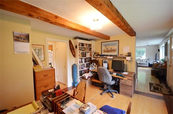 63 Concord Road Wayland, MA 01778 - Photo 12 of 30 a view of a workspace with furniture and gym cycle