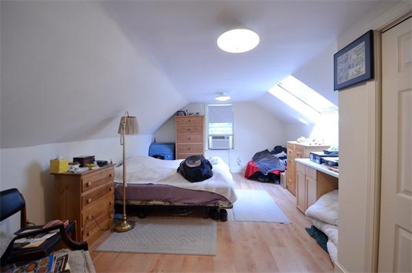 63 Concord Road Wayland, MA 01778 - Photo 15 of 30 a bedroom with furniture and a window