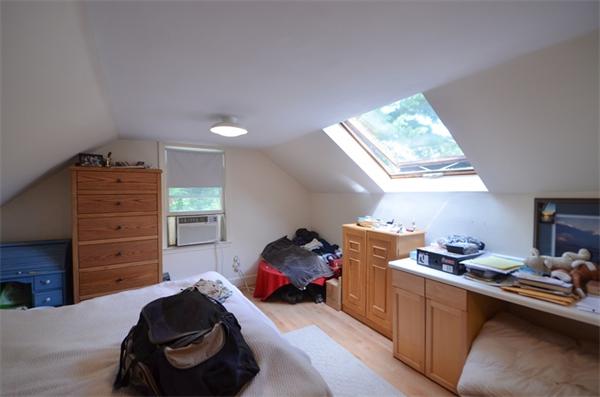 63 Concord Road Wayland, MA 01778 - Photo 16 of 30 a room with a bed and a window