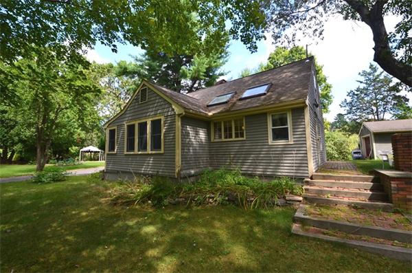 63 Concord Road Wayland, MA 01778 - Photo 23 of 30 a house that has a tree in front of the house