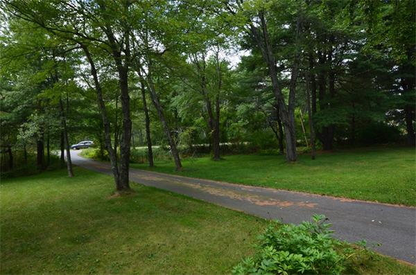 63 Concord Road Wayland, MA 01778 - Photo 30 of 30 a view of a park with tree s