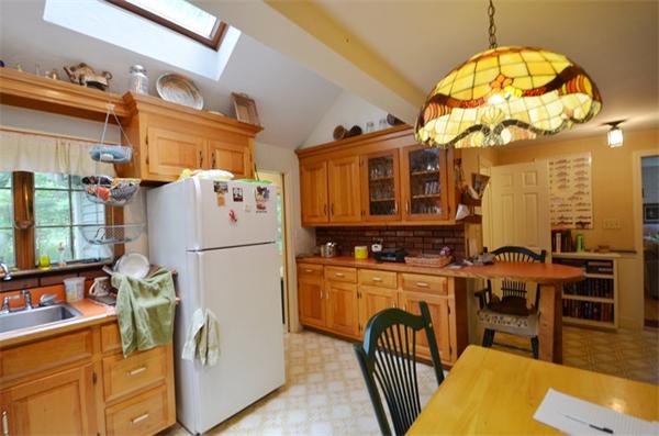 63 Concord Road Wayland, MA 01778 - Photo 3 of 30 a view of a kitchen with appliances and cabinets