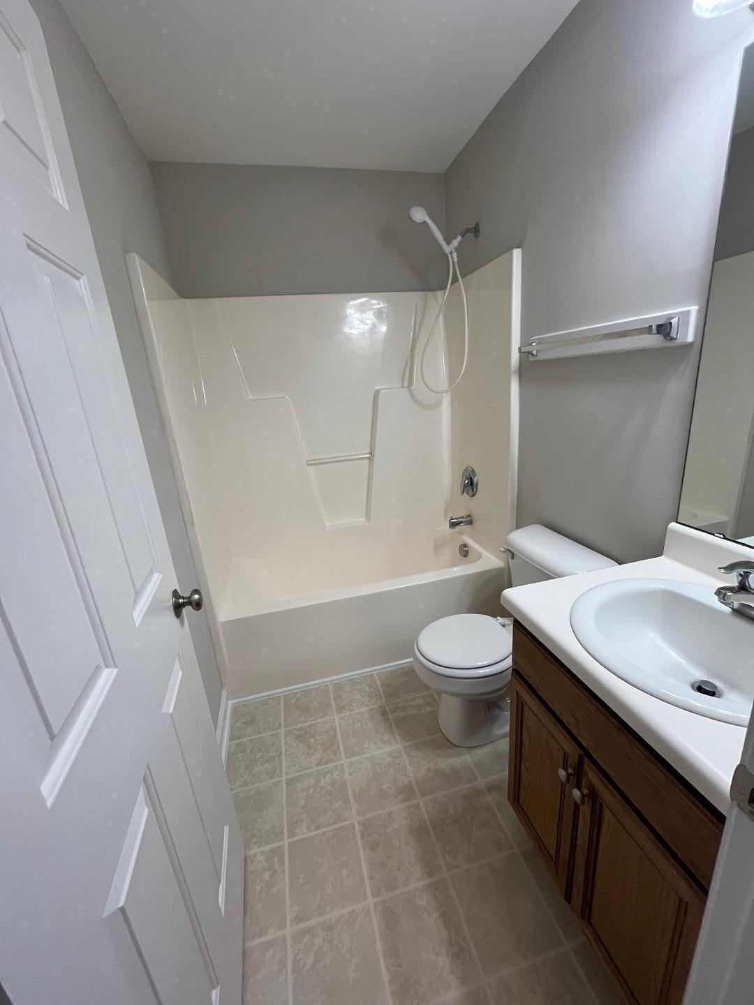 5104 Thornton Knoll Way Raleigh, NC 27616 - Photo 10 of 21 a bathroom with a sink a toilet and shower