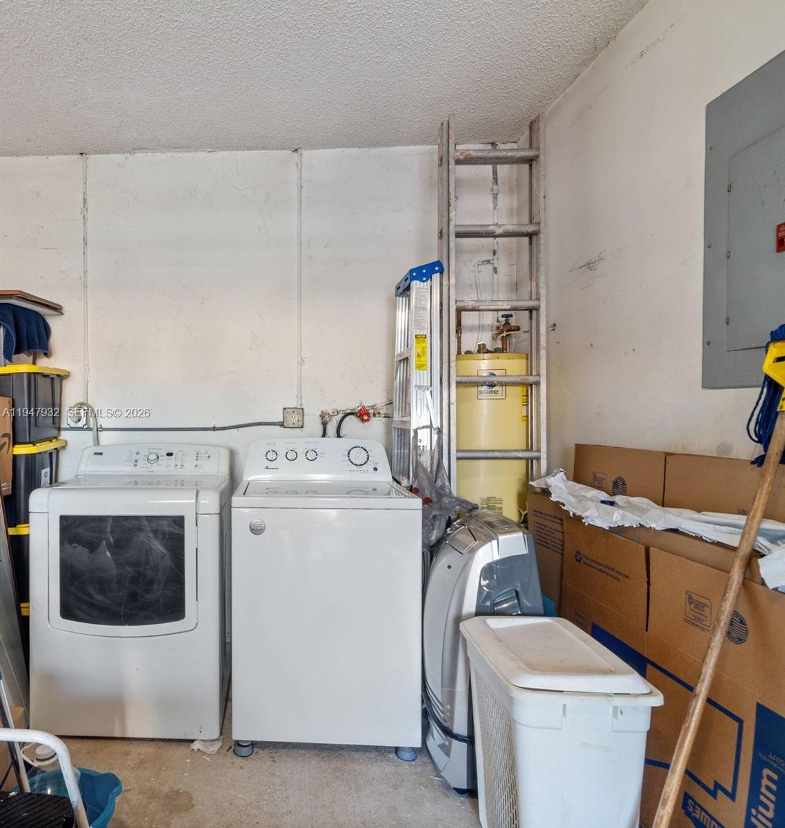 9066 Southwest 147th Court Miami, FL 33196 - Photo 28 of 31 a utility room with dryer and washer