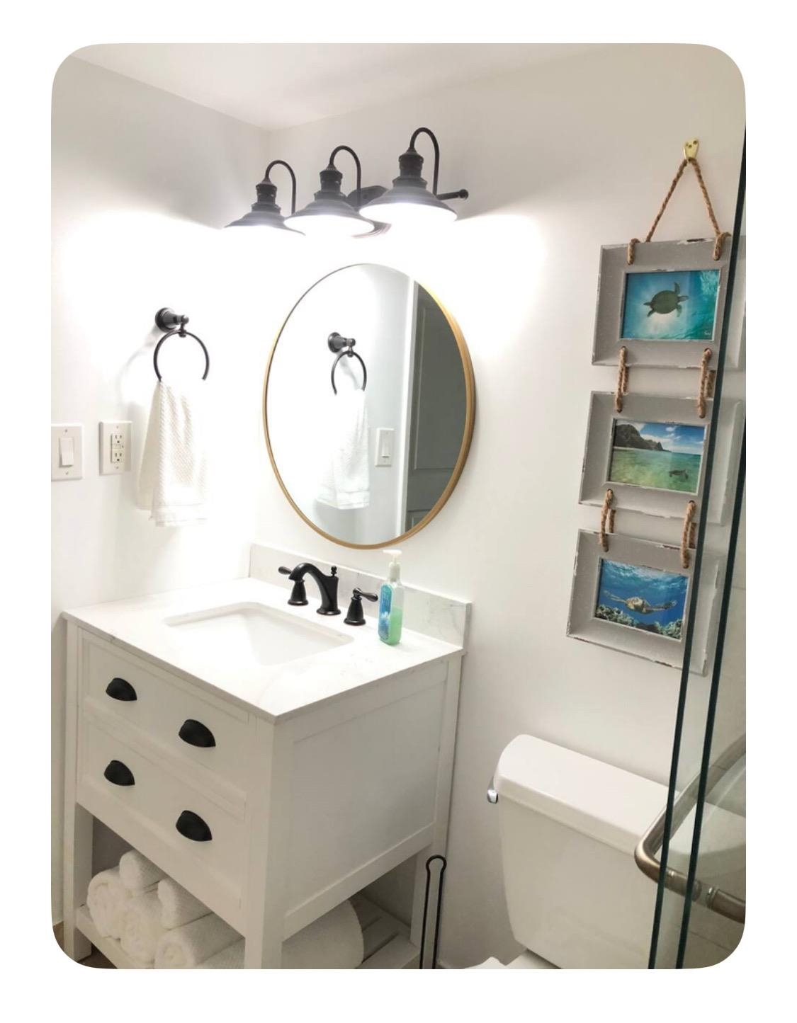 120 Hui Rd F, Unit B5 Lahaina, HI 96761 - Photo 10 of 17 a bathroom with a sink mirror vanity and toilet