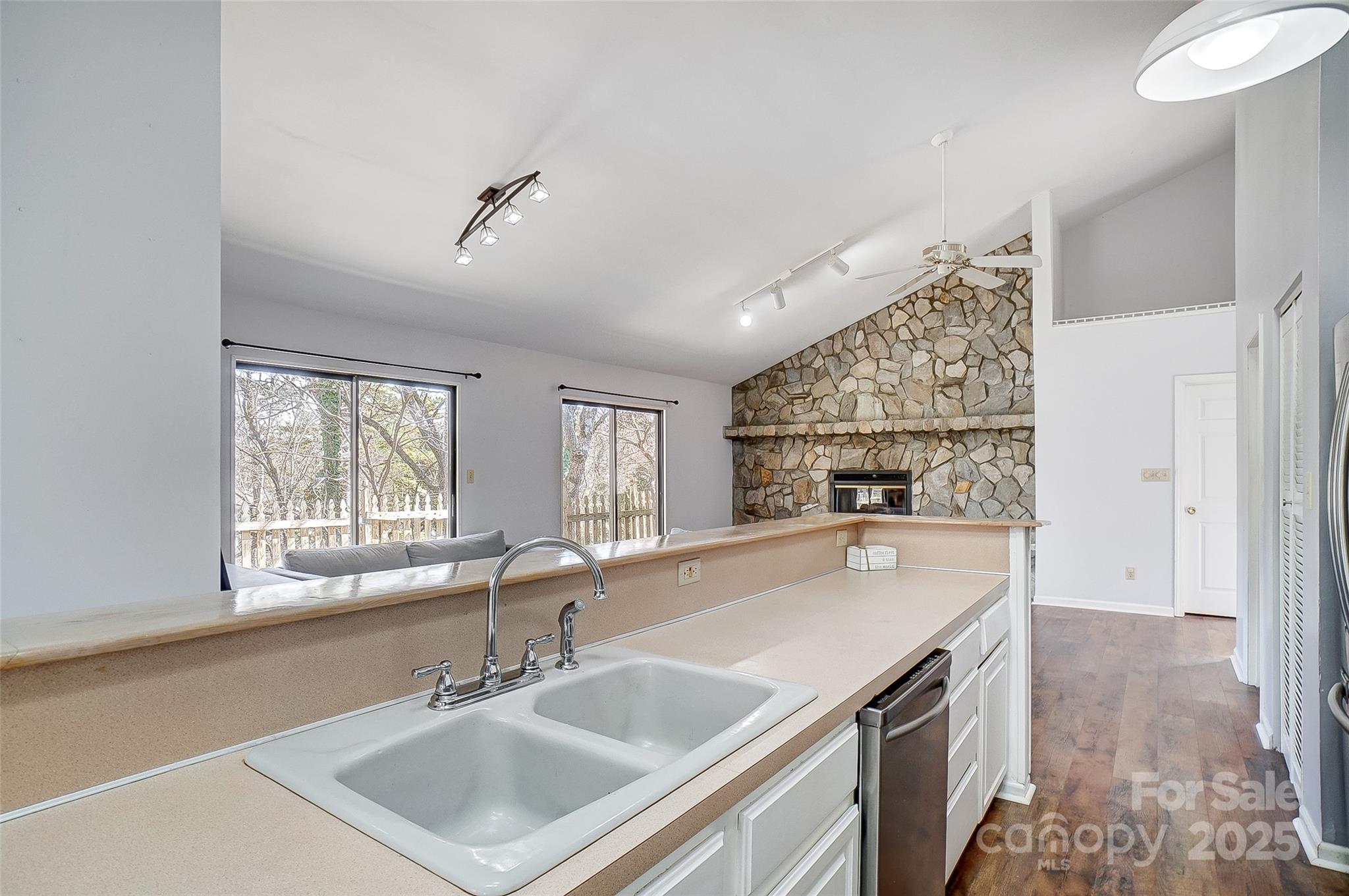 1205 Molokai Drive Tega Cay, SC 29708 - Photo 12 of 33 a kitchen with stainless steel appliances a sink and a stove