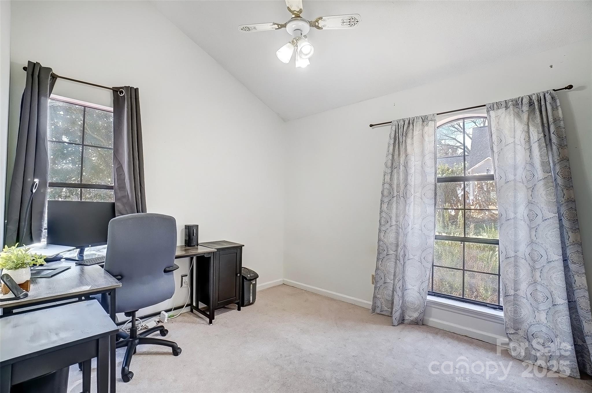 1205 Molokai Drive Tega Cay, SC 29708 - Photo 22 of 33 a view of a workspace with furniture and a window