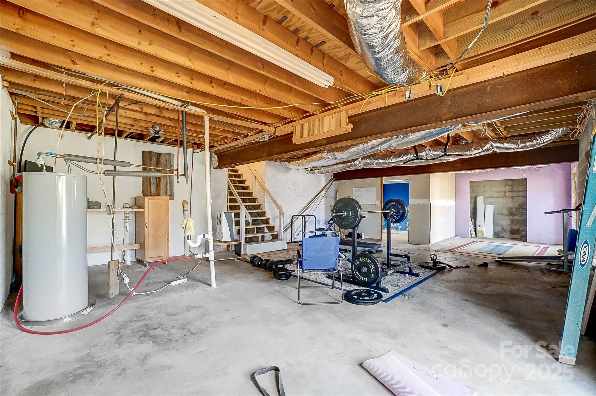 1205 Molokai Drive Tega Cay, SC 29708 - Photo 26 of 33 a view of a room with gym equipment