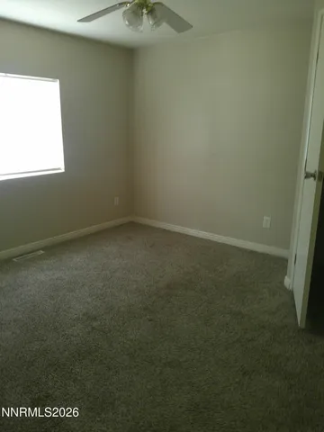 a view of a room with basketball court