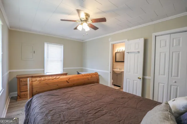 a bathroom with a sink a mirror and a toilet