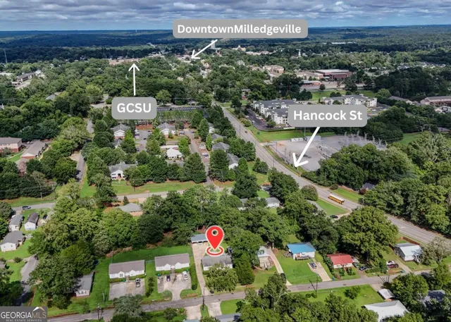 an aerial view of residential house and outdoor space