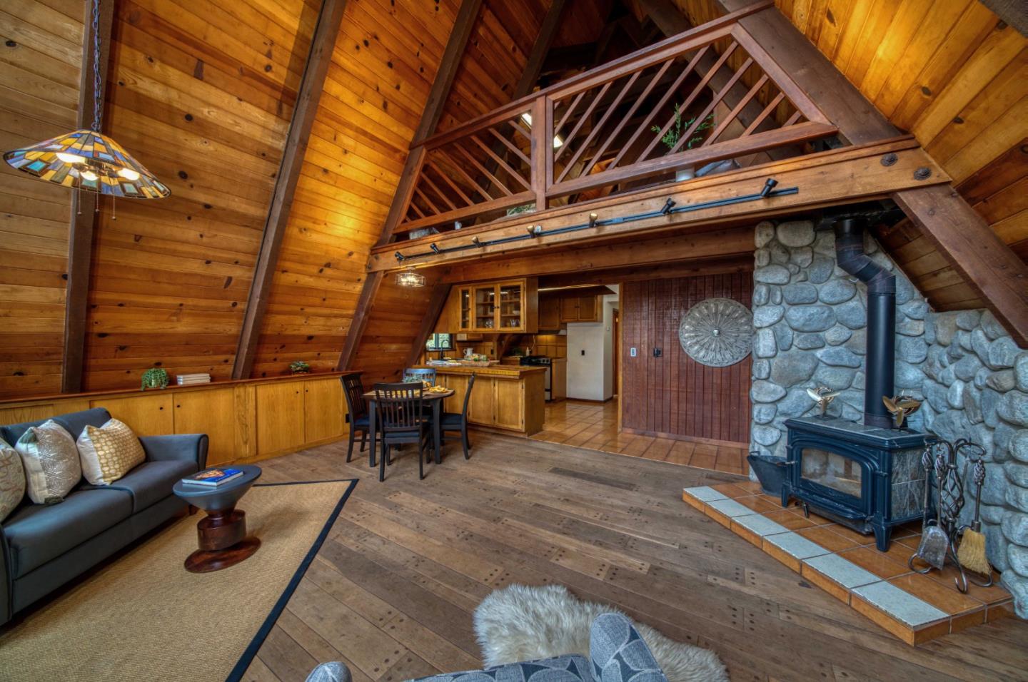 525 Bohnen Road Santa Cruz, CA 95065 - Photo 9 of 29 a living room with furniture and a fireplace