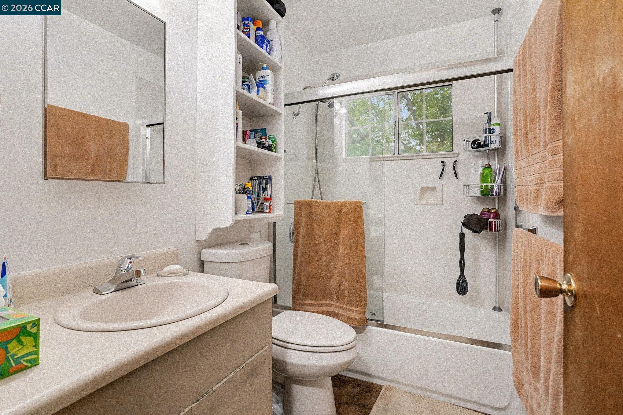 4041-4047 Ellis Road Martinez, CA 94553 - Photo 20 of 20 a bathroom with a sink toilet and shower