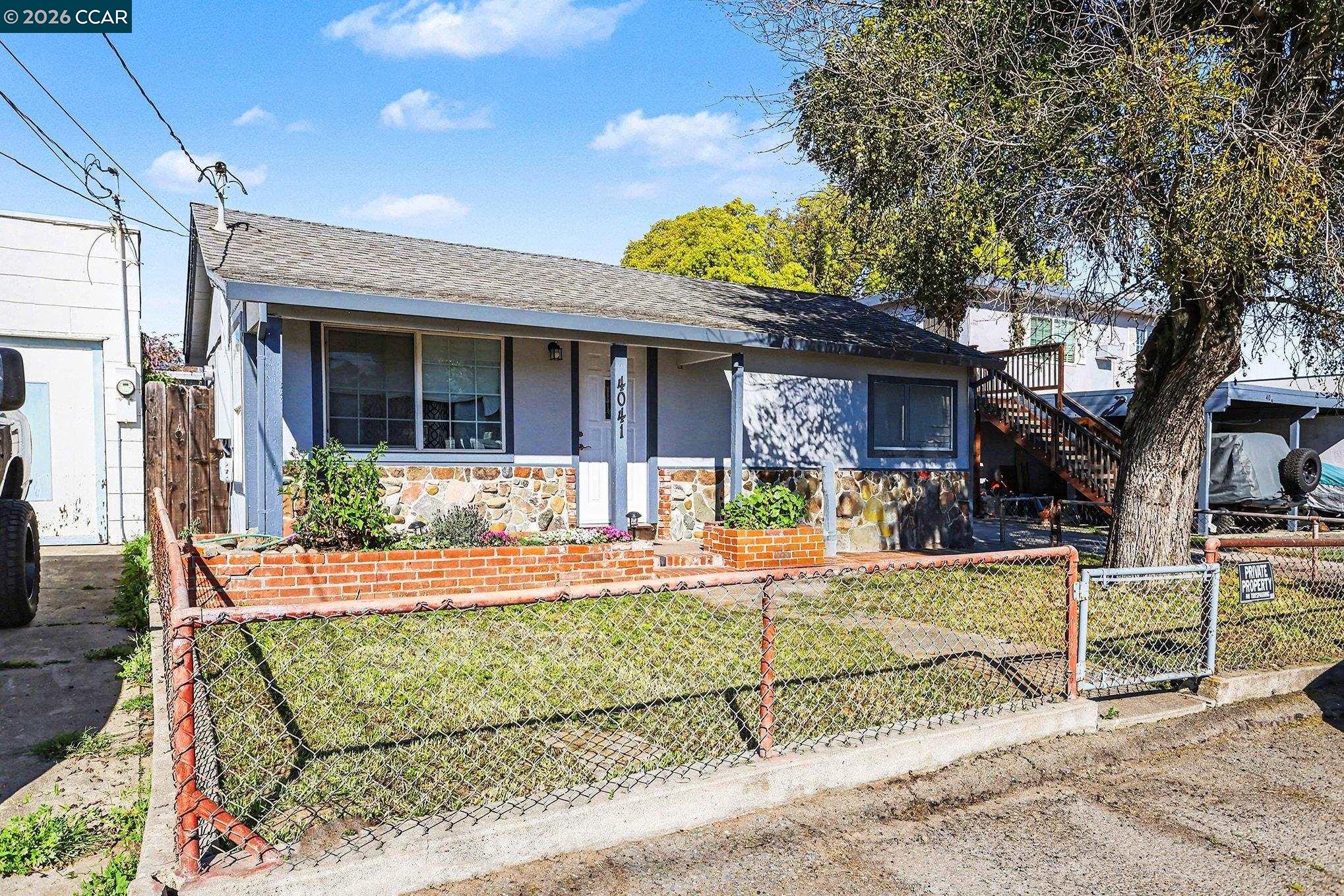 4041-4047 Ellis Road Martinez, CA 94553 - Photo 2 of 20 a view of a house with backyard and porch