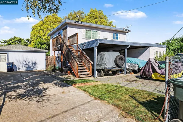 a view of a house with tub and chairs