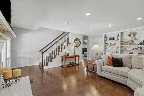 a living room with furniture and a table