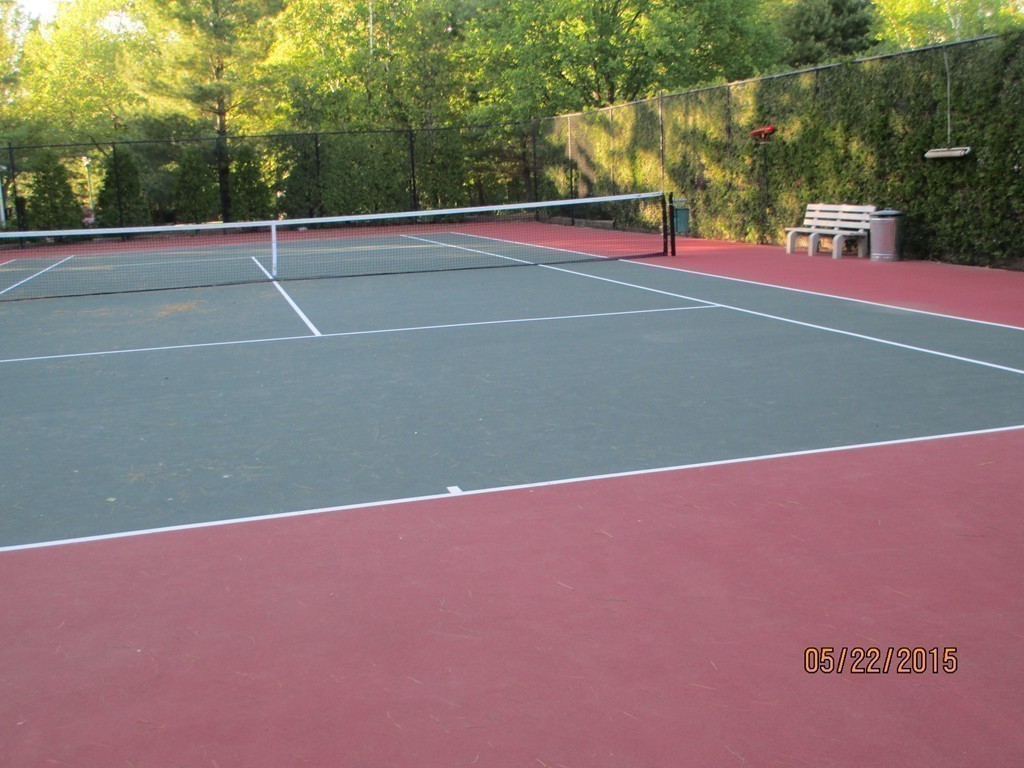335 Bishops Forest Drive, Unit 335 Waltham, MA 02452 - Photo 20 of 21 a view of a tennis court