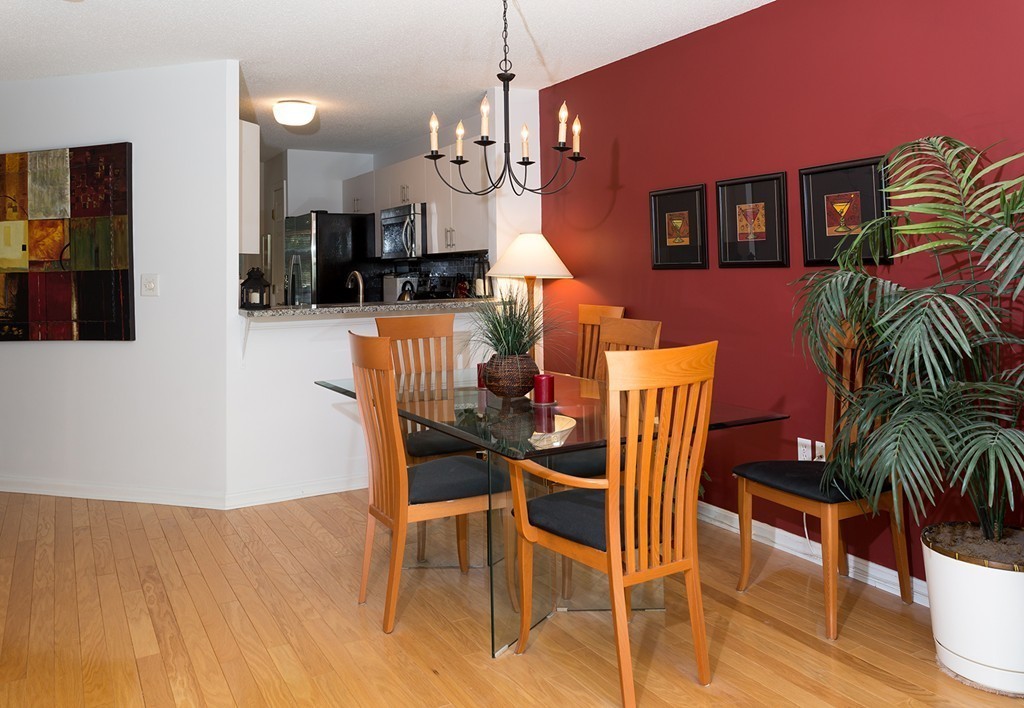 335 Bishops Forest Drive, Unit 335 Waltham, MA 02452 - Photo 6 of 21 a view of a dining room with furniture
